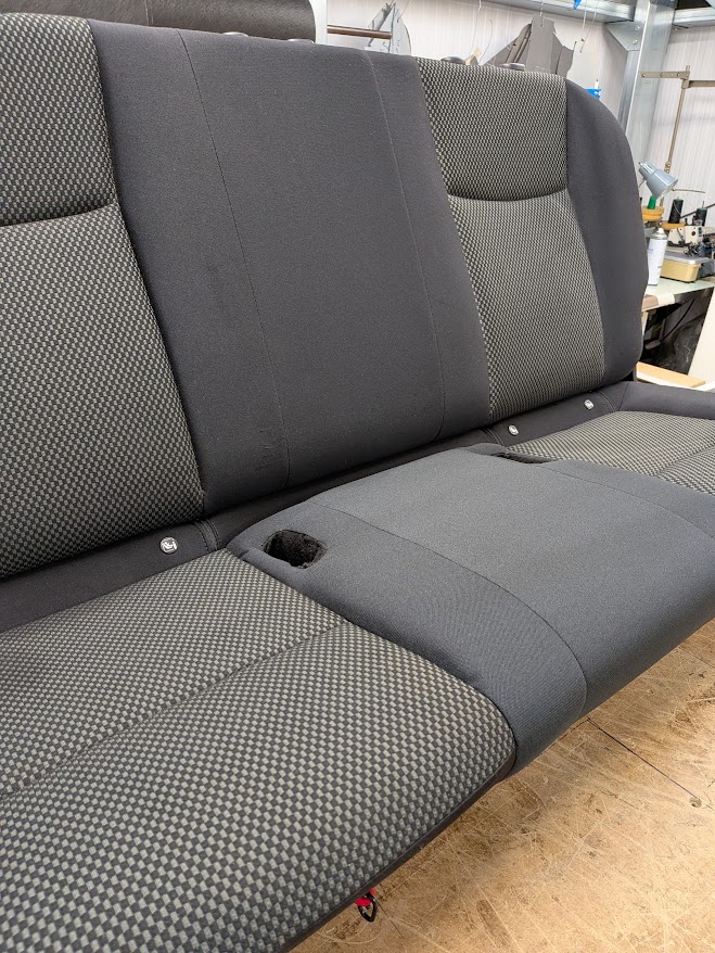 Fabric vehicle seat after the centre panel was replaced